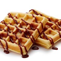 Belgian,Waffles,With,Chocolate,Sauce,Isolated,On,White,Background